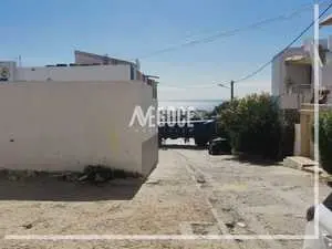  un terrain,situé à Hammamet derrière magasin de jouets bahroun 