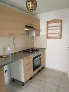 Appartement S+2 HST ave place de parking sous sol a loulija