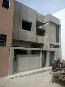 A vendre une maison R+1Inachevé Terrain (115m²) en Face AZIZA à Bhar lazreg 