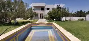 Une villa avec piscine à ELMONCHAR Hammamet sud 27246323