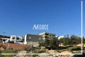  un terrain,situé à Kharrouba Hammamet Nord. 