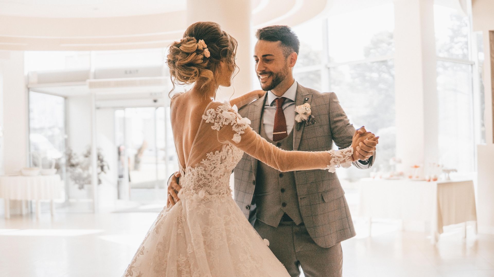 Is it necessary to remove existing adhesive residue before applying the dance floor wraps?