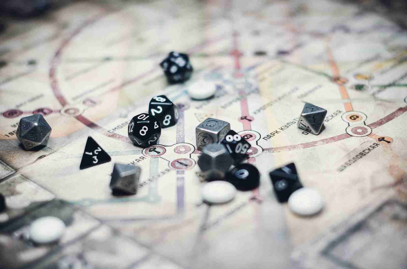black and white dice on white and black textile