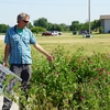 CCC Environmental Sustainability Director Ben Newton conducts a tour of the pollinator garden at the Grand Island Campus.