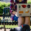 Oregon State University student working outside in the Memorial Union Quad