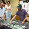 Students and faculty in ESF’s Department of Landscape Architecture research ways to make cities more sustainable, including using a table that simulates the flow of water in an urban area.