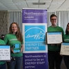 The sustainNU team shares how they conserve energy at the ENERGY STAR® photo booth at Northwestern University's inaugural Earth Day Fair.