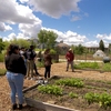 Students listen in during a tour of the Sustainable Garden at Stanislaus State