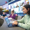 A student in the Impact MBA program at Colorado State University attends class with virtual connections.