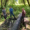 Cascadia students working on berm restoration for our stormwater project in the campus wetland!