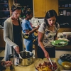 Participants in Luther College's CSA Reimbursement Program enjoy a summer workshop about seasonal vegetables.