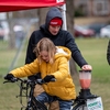 Attendees use pedal power to make smoothies with all vegan ingredients