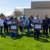 All of the people who attended the clean up with signed signs.