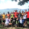 First Year Orientation leaders for the Root program at Williams College celebrate the end of a farm volunteer day