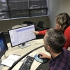 The scheduling staff optimizing space utilization through the College's scheduling software.