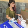 UNLV Take Back the Tap Founder, Monica Garcia, counting bottles collected at a trade in event!