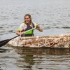 Central Community College, NE Environmental Sustainability intern, Katy Ayers maiden voyage of her eBadge project the Myconoe-an 8’ canoe grown from fungal mycelium, the main body of a fungus. The Myconoe flourishes back to life after a float, growing colorful mushrooms.