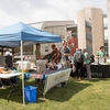 Student groups setting up for the Zero Waste Resource fair during Cal Poly Earth Week