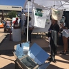 Student volunteer, Cheerie Patneaude, and our solar cooker