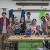 Group of students participating in a spoon making event in Spring 2019.