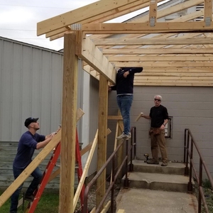 Kent State University College of Architecture and Environmental Design Construction Management Student Organization raised $4000 of the $5000 needed to build a shelter entrance at the Phyllis Zumkehr County Clothing Center. With help from faculty advisor, Joe Karpinski, and Metis Construction, the team of Construction Management students were able to finish most of the labor in April 2019.