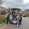 Students at the University of Connecticut hosted a tour of sustainability features on campus with a 10 person party peddler as part of the annual Earth Day Spring Fling.