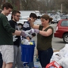 Student body president Cameron Cook '17 and the Sustainability Institute's Jennifer Andrews separate trash, recyclables and compostable items at the Earth Day Dumpster Dive.