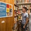 Students look for books at the Connecticut College Lending Library.