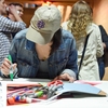 NYU student creating posters for March for Science in Washington, DC on April 22, 2017