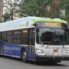 One of Columbia University's new electric buses traveling along Broadway in New York City