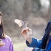 Lia Bobay works with mentor Adam Fudickar to band and measure birds to track bird migration affected by climate change.