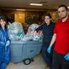 Monica Foster (VP College Services and CFO), Martha MacGowan (Sustainability Technologist), and Amel Muskic (Facilities Support Assistant) completing a waste audit.