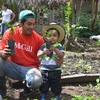 Jorge Luis Godines Perez, one of the farm owners of the Unión de Cafetaleros Orgánicos de Ángel A. Corzo (UCOAAC) coffee cooperative, with his son.