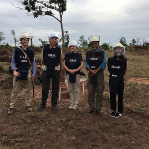 The Under-Told Stories team reporting on an effort to clear mine fields in Cambodia.