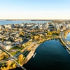 The downtown Madison Isthmus and the Wisconsin State Capitol, along with Monona Bay and John Nolen Drive, are pictured in an early morning aerial taken from a helicopter on Oct. 23, 2018