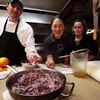 Students in the Nutrition class work with Executive Chef Simeon Bittman (left) on a recipe for braised cabbage.