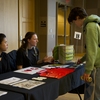 Student volunteers distributing composting minibins