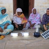 IMG_0597.jpg Four participants of the Barefoot College display their projects.