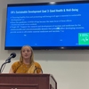 A Batten Honors College student presents her senior capstone project at the inaugural Ryan Environmental Research Symposium. Students were required to relate their project to the UN Sustainable Development Goals.