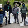 Bowie State volunteers begin the journey to the clean up at local Horsepen Park