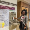 Angela Anima-Korang, a Southern Illinois University student and Sustainability Office Team member, uses one of the water bottle refill stations on campus.