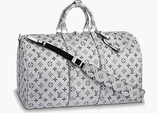 LOUIS VUITTON. Sac Keepall 50cm en toile monogram et cui…