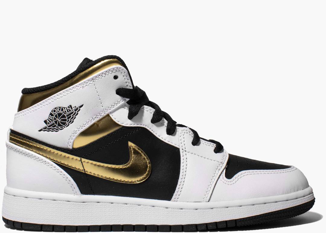 gold and black and white jordan 1