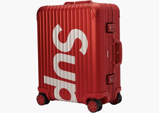 Supreme / Rimowa Topas Multiwheel 45L Red | Hype Clothinga Supreme / Rimowa Topas Multiwheel 45L Red | Hype Clothinga
