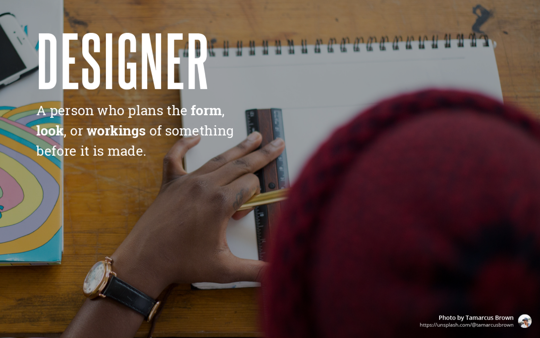 Slide defining what a designer is.