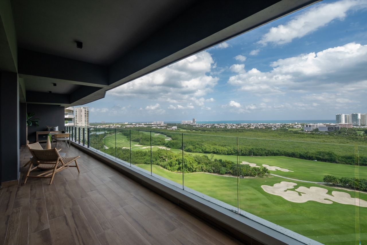 Departamento de Lujo en Venta en Woha Puerto Cancún con Terraza y Vista Espectacular