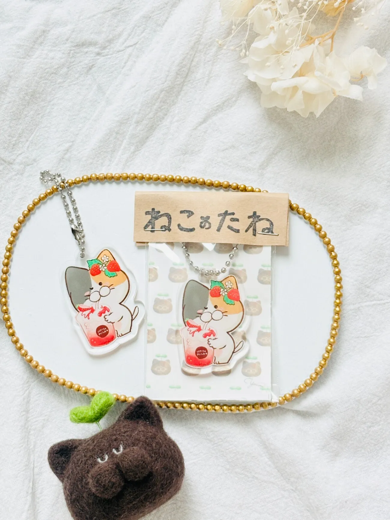 アクリルキーホルダー「みー」｜ねこのたね 絵本キャラクター