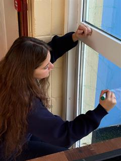 Art students and Ms Normoyle getting ready for Christmas here in St Josephs Community College