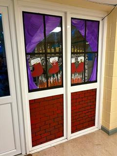 Art students and Ms Normoyle getting ready for Christmas here in St Josephs Community College