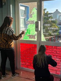 Art students and Ms Normoyle getting ready for Christmas here in St Josephs Community College